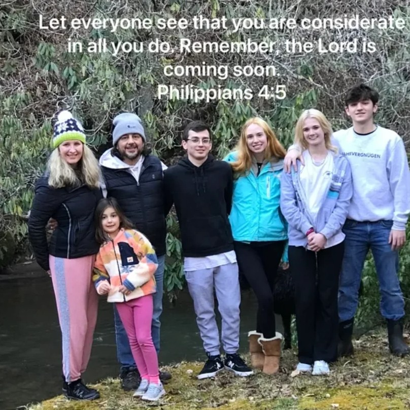 The Tommaso family outdoors, with the verse Philippians 4:5